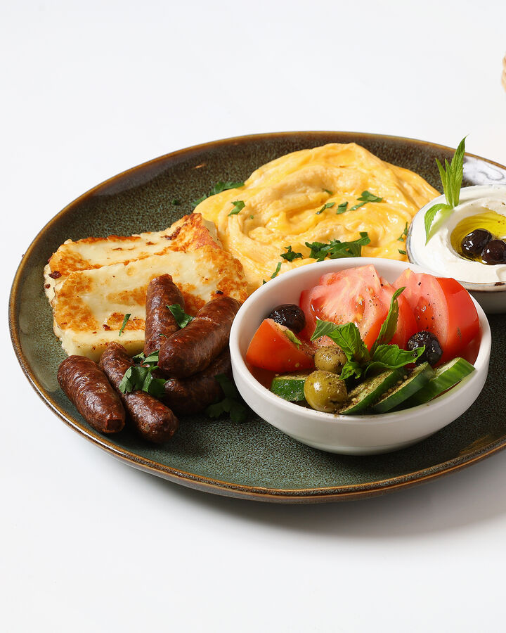 The Lebanese spread: eggs, Lebanese sausage, grilled halloumi, labneh and salad