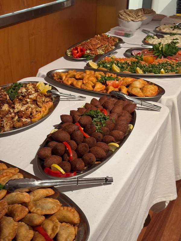 Platters of kebbeh, cheese and meat sambusik and fried cauliflower