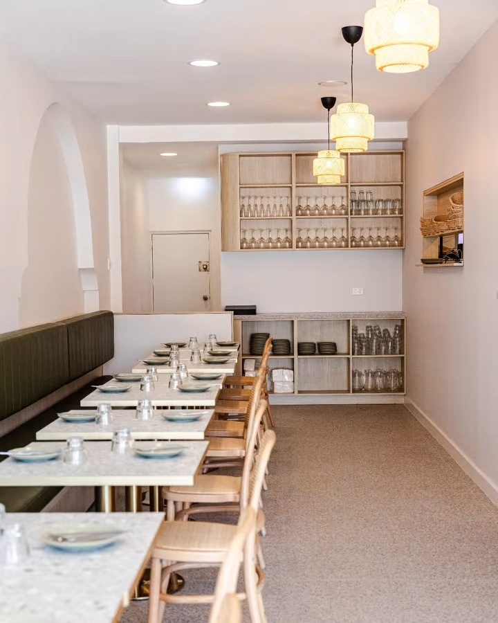 The long Five Dock dining room set for service